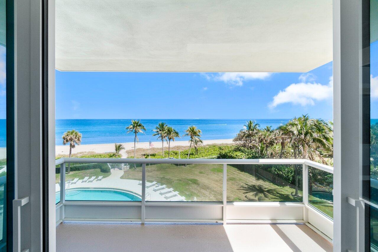 700 South Ocean Boulevard, Unit 405 Boca Raton, FL 33432 - Photo 28 of 59 a view of a glass door with a yard