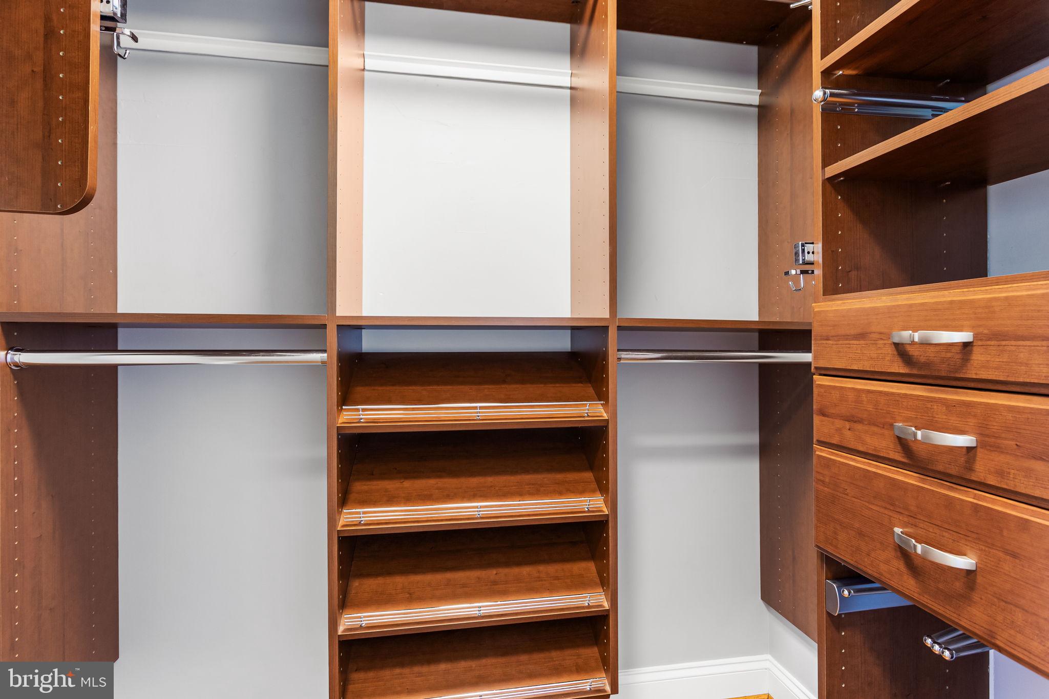 1020 North Highland Street, Unit 621 Arlington, VA 22201 - Photo 16 of 50 a view of walk in closet with clothes and shoes