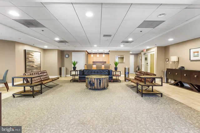 a view of balcony with two chairs and a table