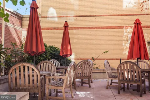 a view of multiple houses with a patio