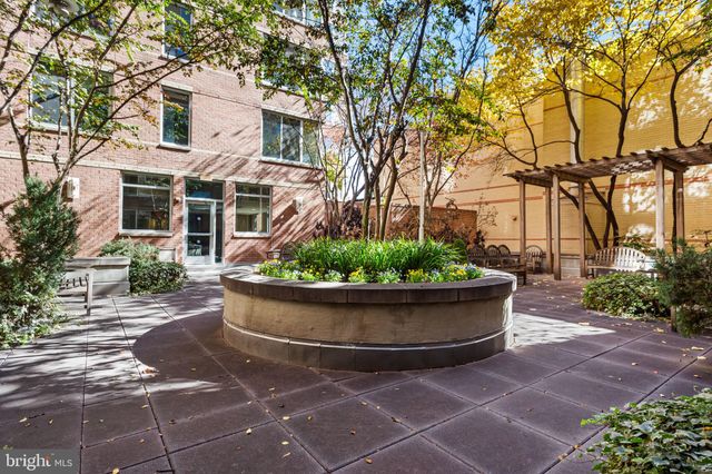 a view of a city with tall buildings