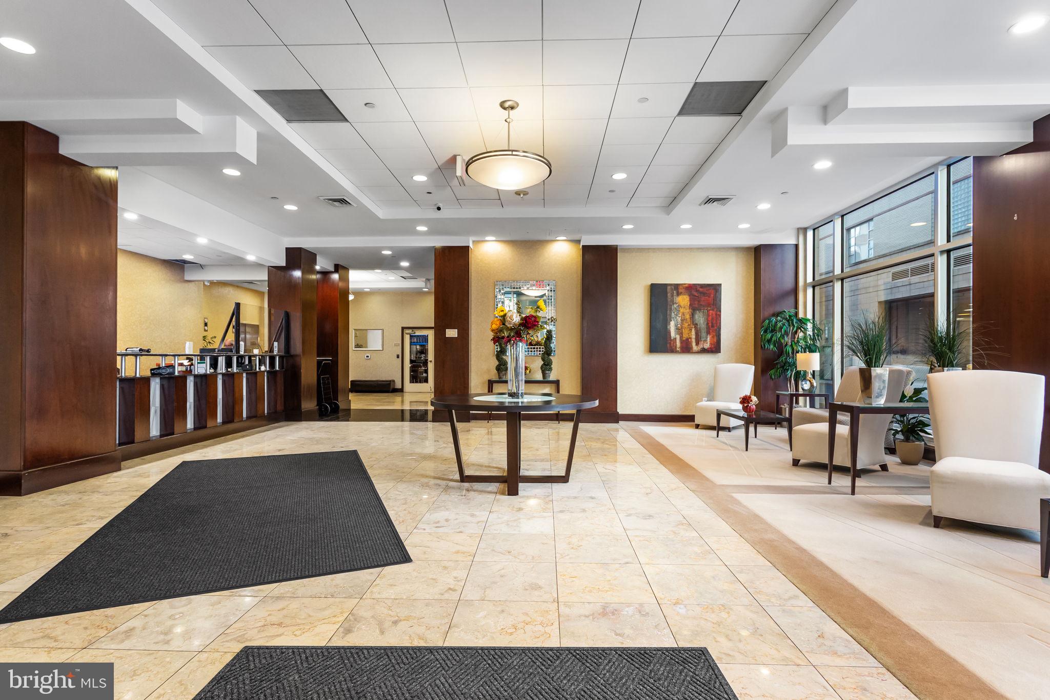 1020 North Highland Street, Unit 621 Arlington, VA 22201 - Photo 35 of 50 a view of a lobby with furniture