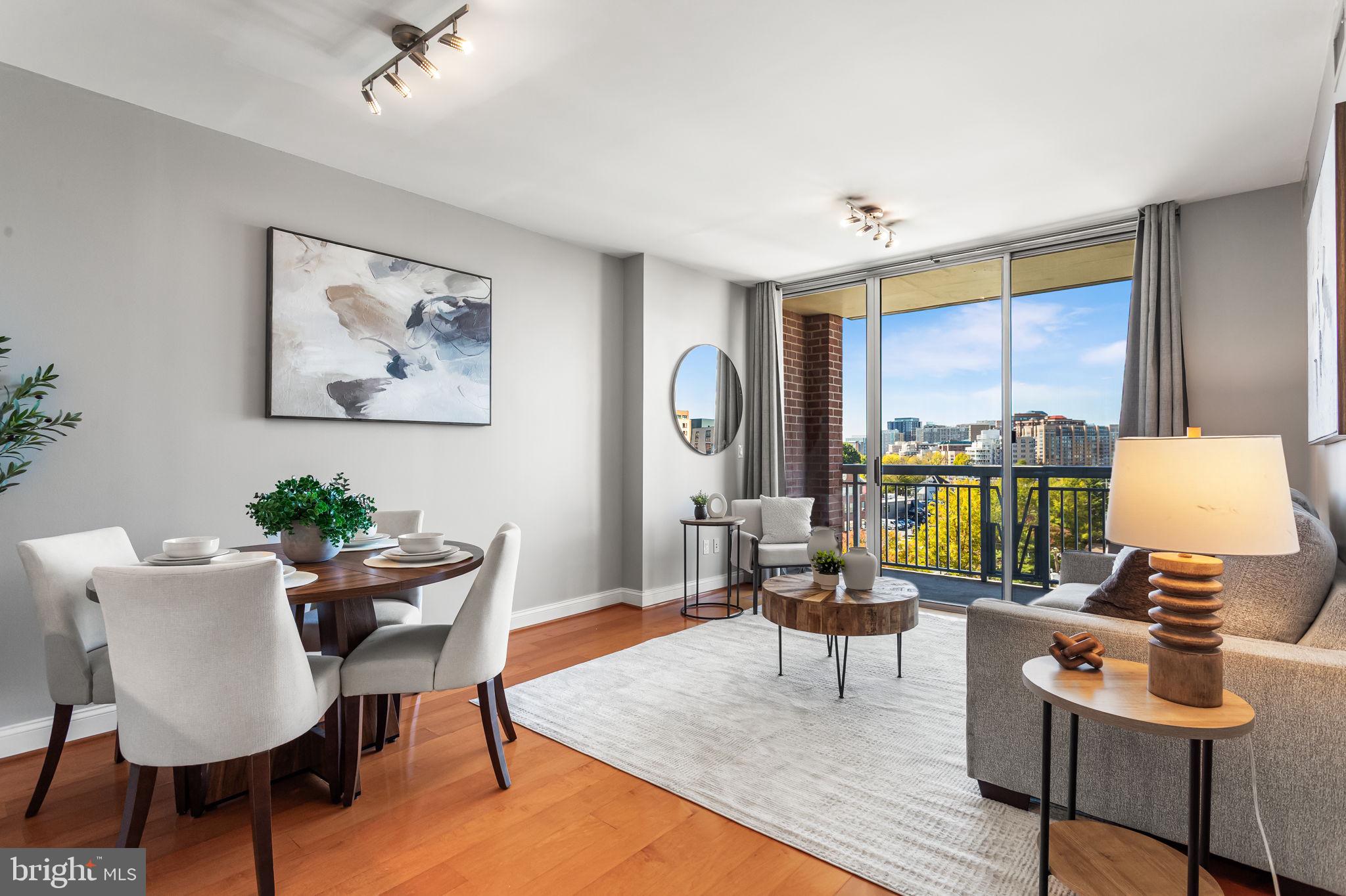 1020 North Highland Street, Unit 621 Arlington, VA 22201 - Photo 4 of 50 a living room with furniture and a wooden floor