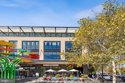 a front view of a building with a street
