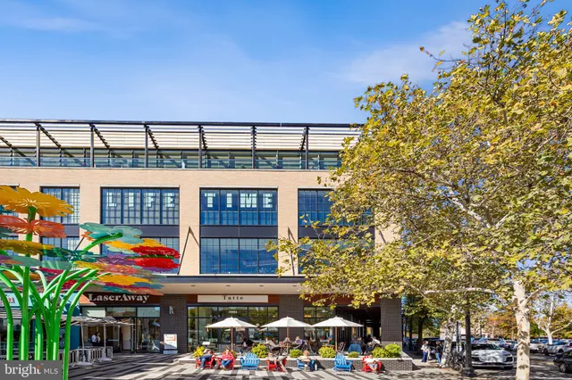 a front view of a building with a street