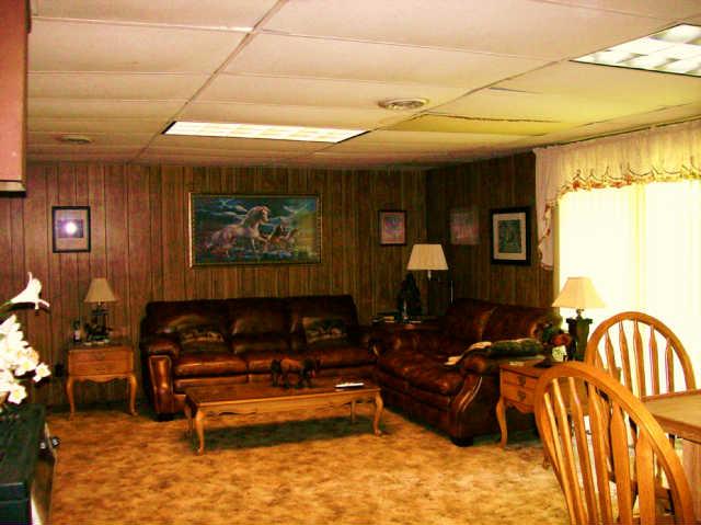 412 S Road Cottontown, TN 37048 - Photo 17 of 20 Mancave, kitchen, office, bath, laundry, storage & 2 bedrooms down here! PERFECT INLAW SET UP!
