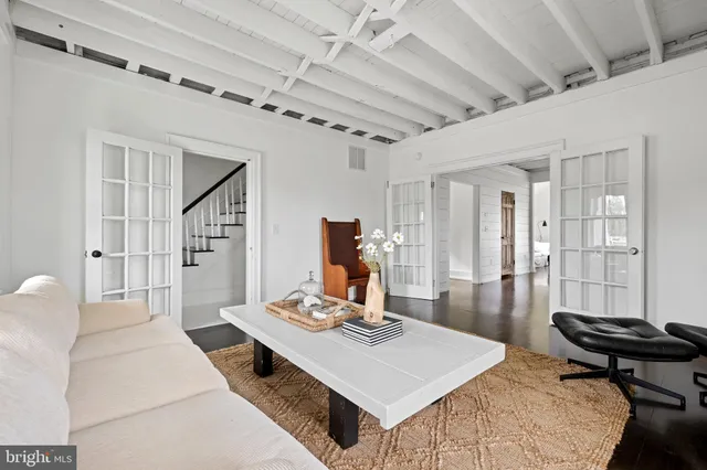 a living room with table