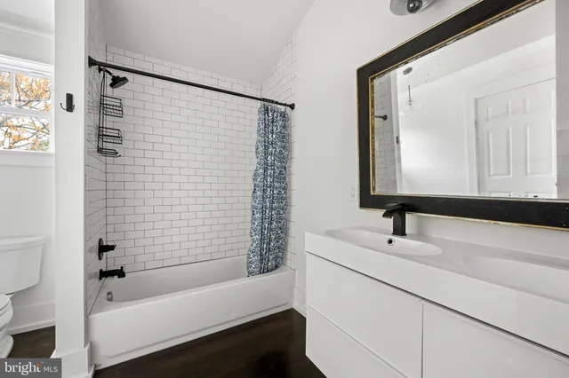 a bathroom with a sink and a bathtub