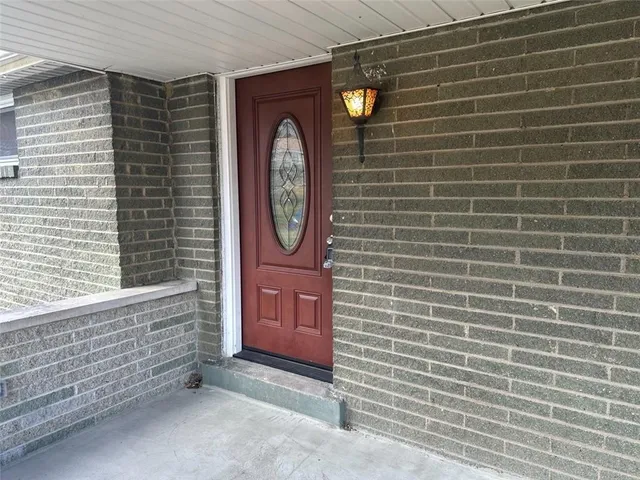 a front view of a house with entryway