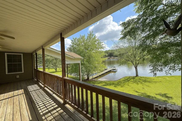 a view of a balcony with lake view