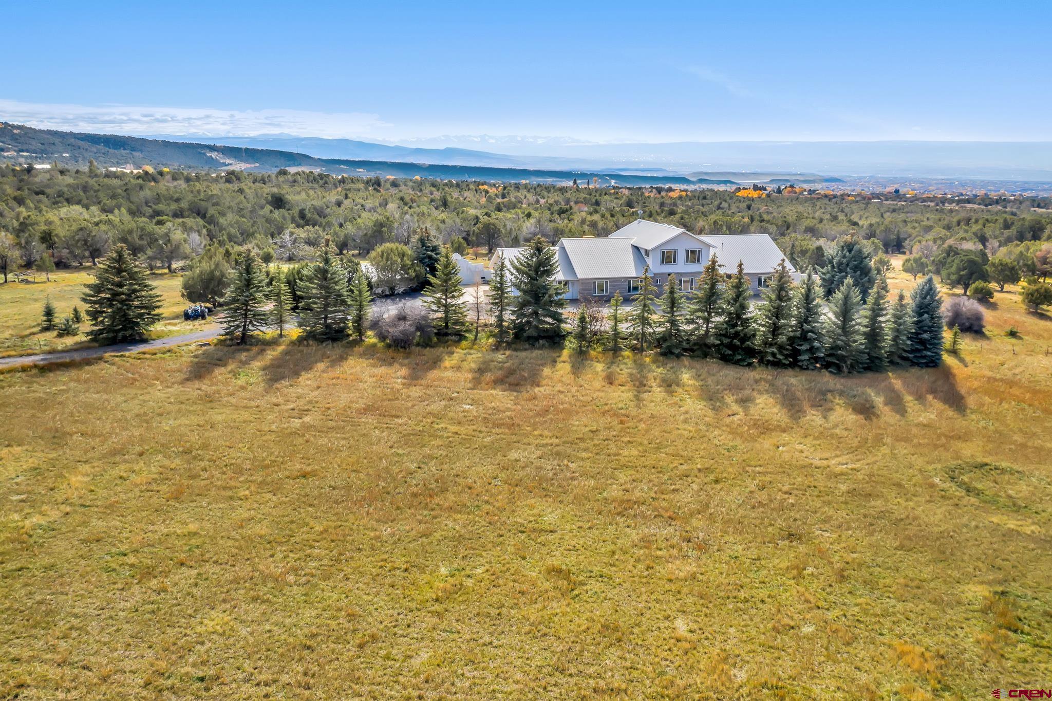 24344 Ute Trail Road Cedaredge, CO 81413 - Photo 1 of 33 a view of a city