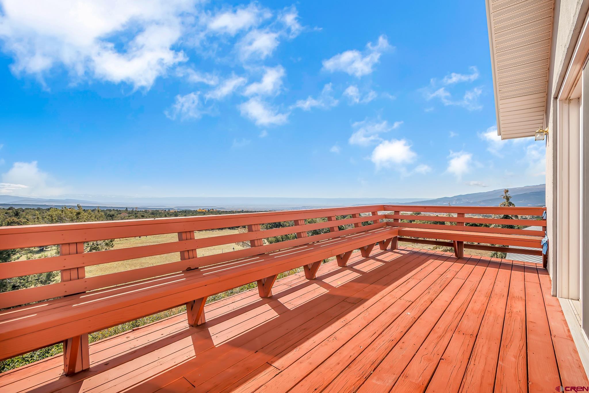 24344 Ute Trail Road Cedaredge, CO 81413 - Photo 12 of 33 a view of balcony with wooden floor