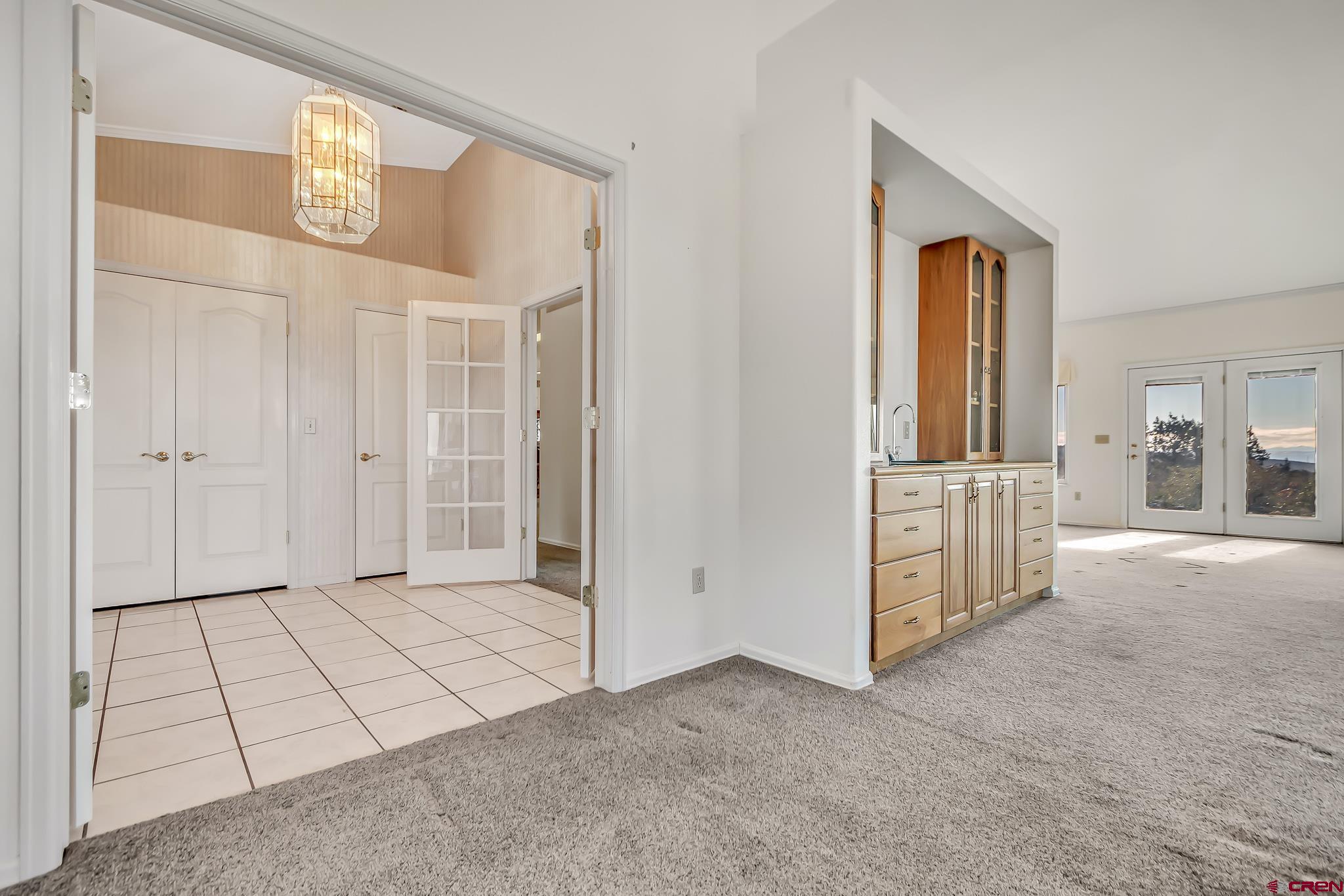 24344 Ute Trail Road Cedaredge, CO 81413 - Photo 21 of 33 wooden floor with white walls