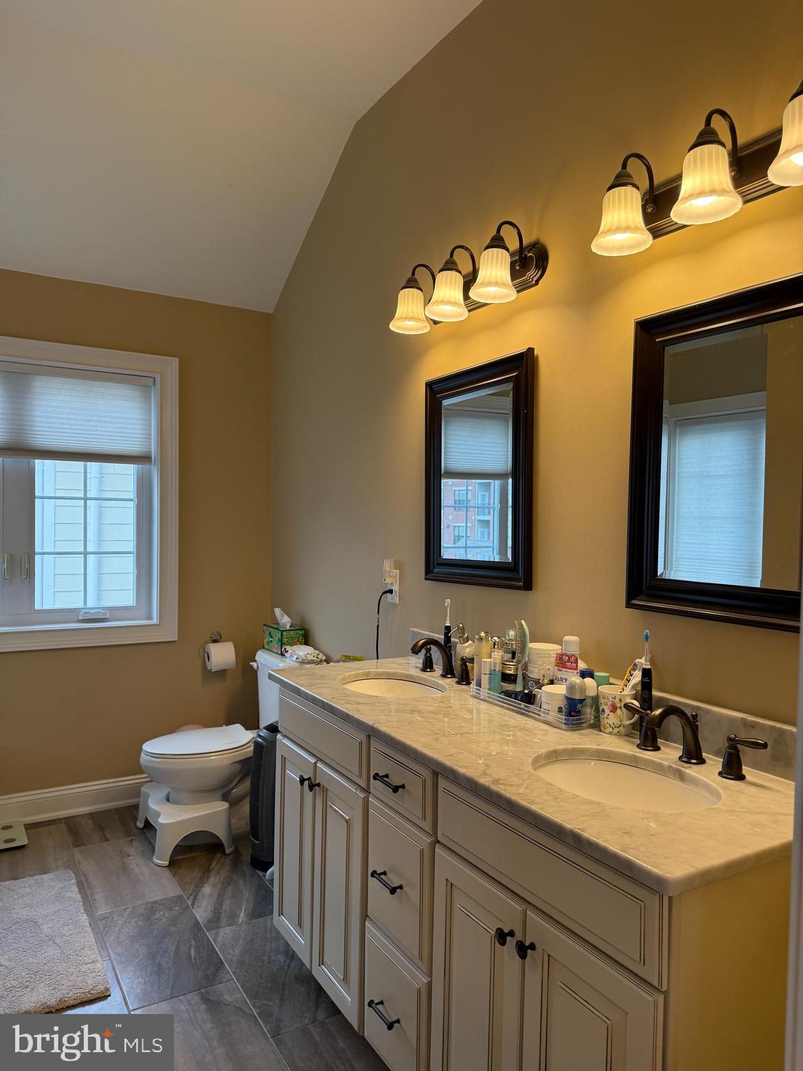 10 Harris Road Princeton, NJ 08540 - Photo 12 of 28 a bathroom with a sink and a mirror