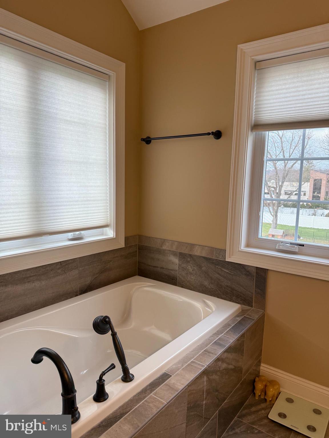 10 Harris Road Princeton, NJ 08540 - Photo 13 of 28 a bathroom with a tub and a window