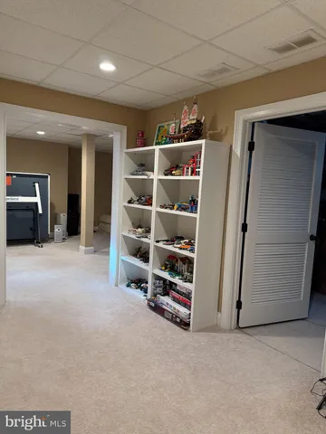 an empty room with furniture and closet