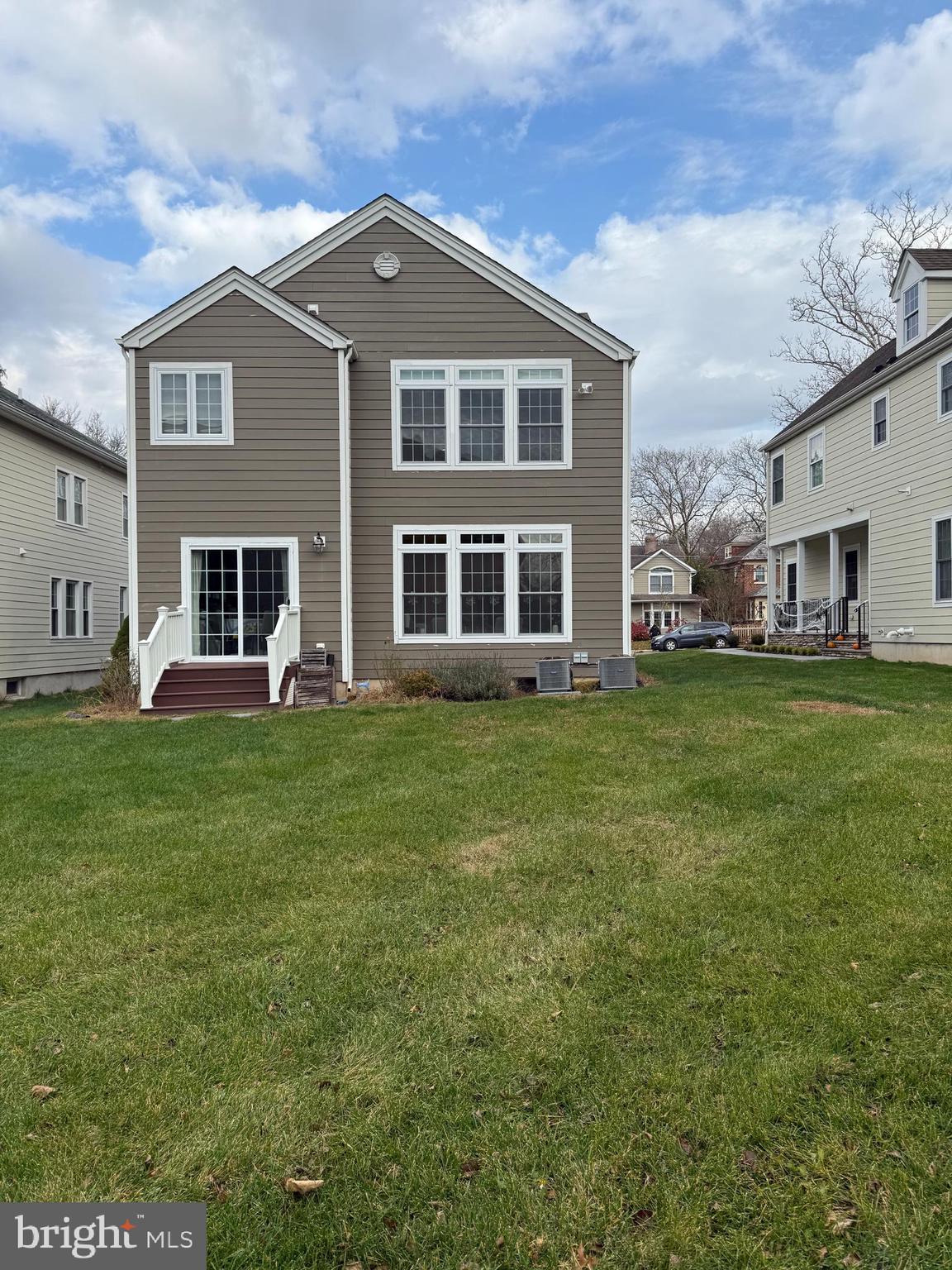 10 Harris Road Princeton, NJ 08540 - Photo 24 of 28 a front view of a house with a garden
