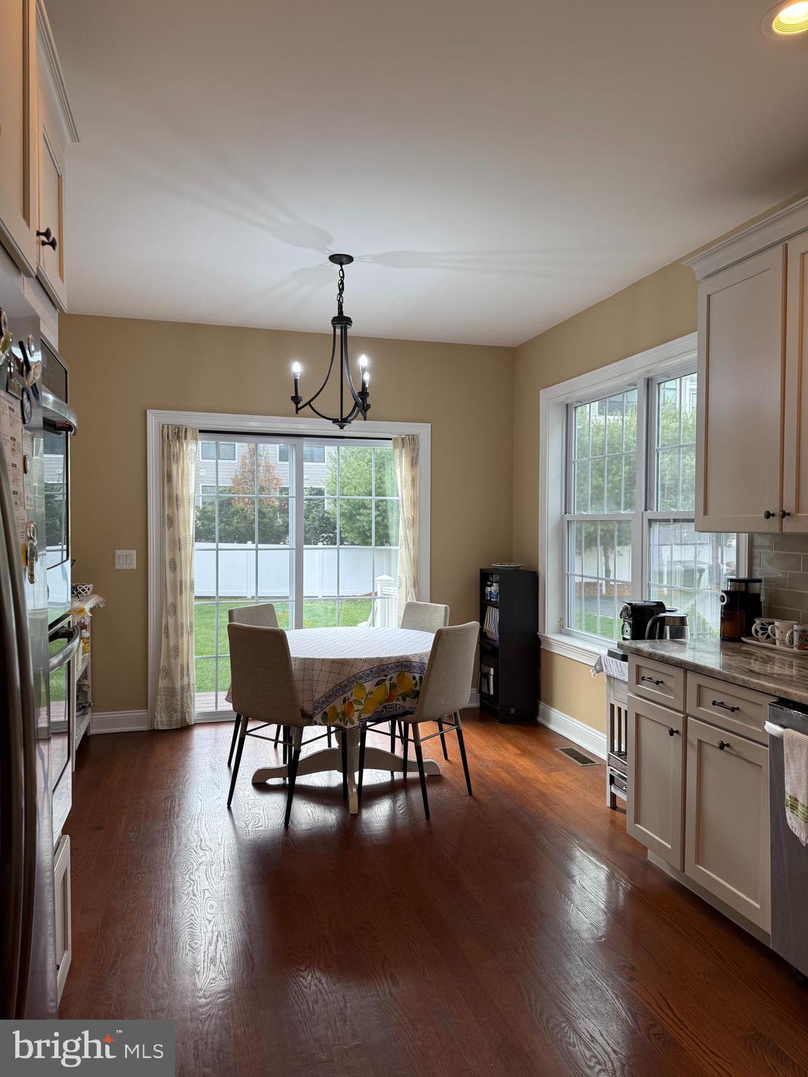 10 Harris Road Princeton, NJ 08540 - Photo 3 of 28 a view of a dining room with furniture window and wooden floor