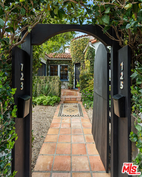 a view of a garden with pathway