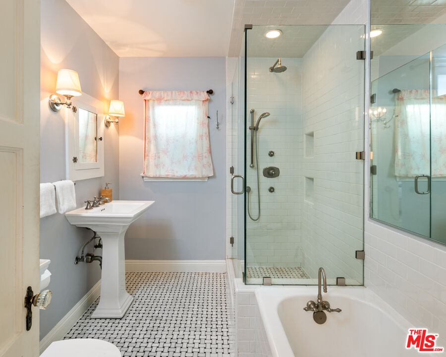723 Crestmoore Place Venice, CA 90291 - Photo 14 of 33 a bathroom with a sink shower and a mirror