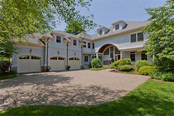 23 Slocum Road Lexington, MA 02421 - Photo 1 of 30 a front view of a house with garden