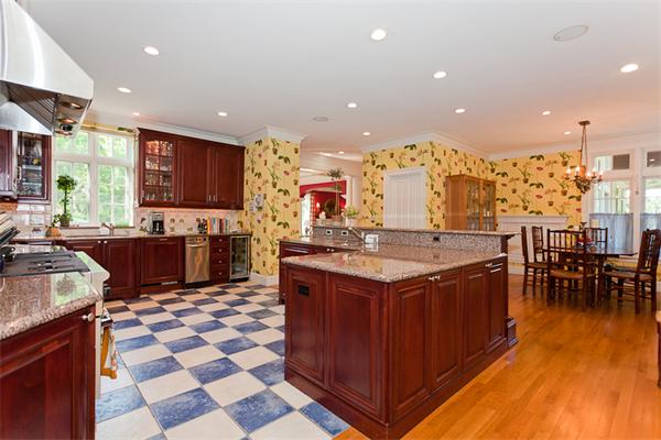 23 Slocum Road Lexington, MA 02421 - Photo 11 of 30 a kitchen with stainless steel appliances granite countertop a sink and a view of center island