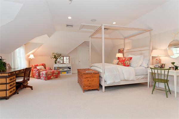 23 Slocum Road Lexington, MA 02421 - Photo 19 of 30 a bedroom with furniture and a chandelier