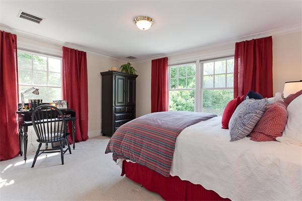 23 Slocum Road Lexington, MA 02421 - Photo 21 of 30 a bedroom with a bed and a window