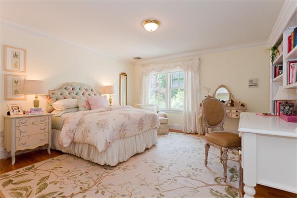 23 Slocum Road Lexington, MA 02421 - Photo 22 of 30 a bedroom with a bed and a table in it