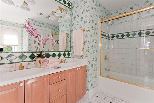 23 Slocum Road Lexington, MA 02421 - Photo 23 of 30 a bathroom with a sink vanity tub and shower