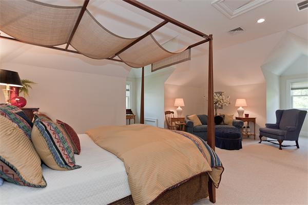 23 Slocum Road Lexington, MA 02421 - Photo 25 of 30 a bedroom with a bed a couch and dresser