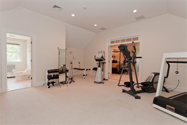 23 Slocum Road Lexington, MA 02421 - Photo 26 of 30 a view of a room with gym equipment