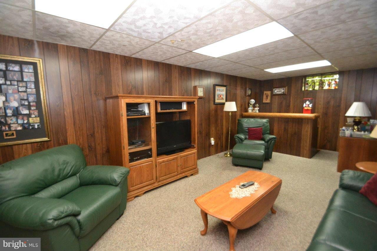 311 Bryanstone Road Reisterstown, MD 21136 - Photo 20 of 23 a living room with furniture and a window