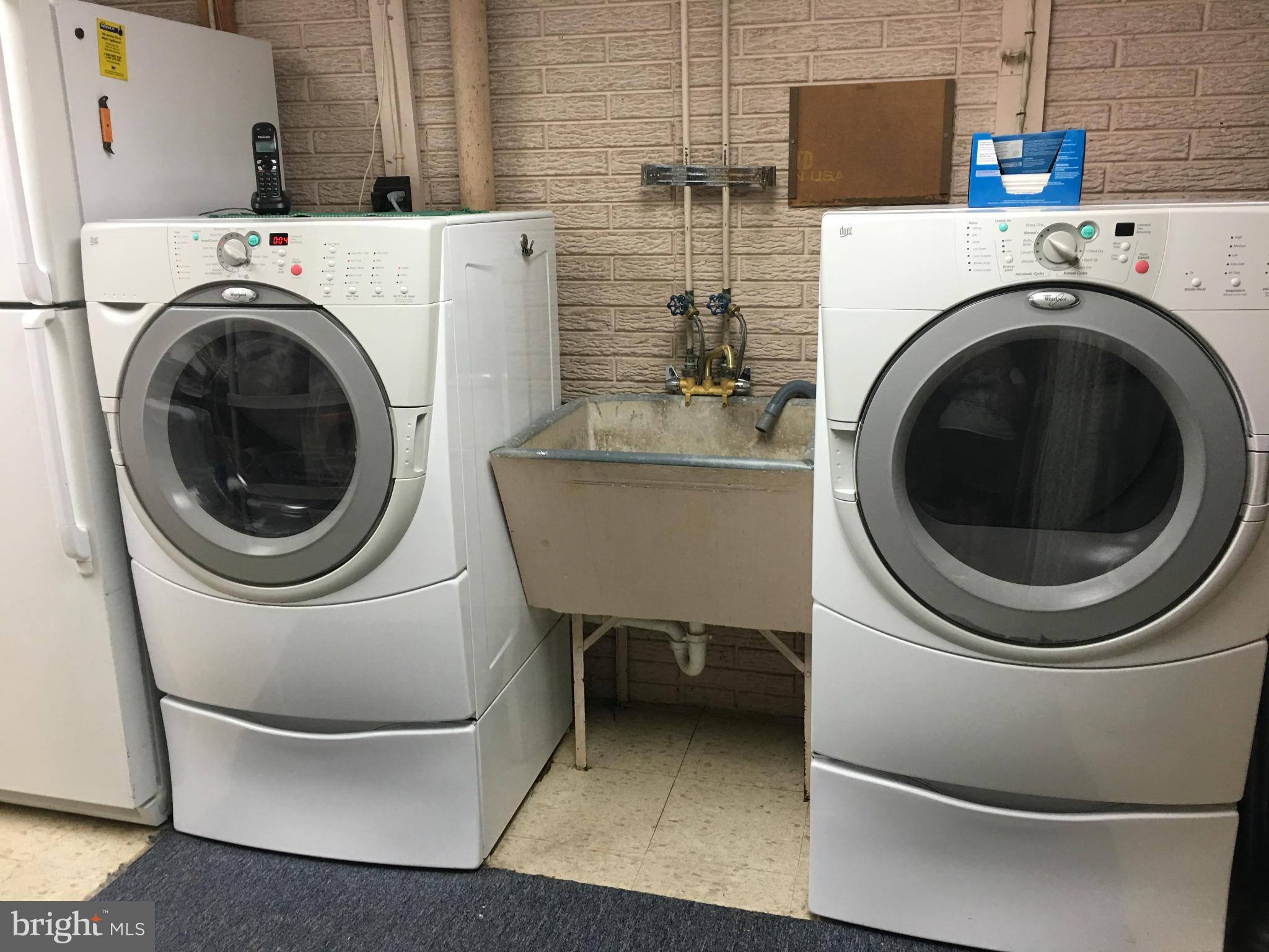 311 Bryanstone Road Reisterstown, MD 21136 - Photo 22 of 23 a utility room with dryer and washer
