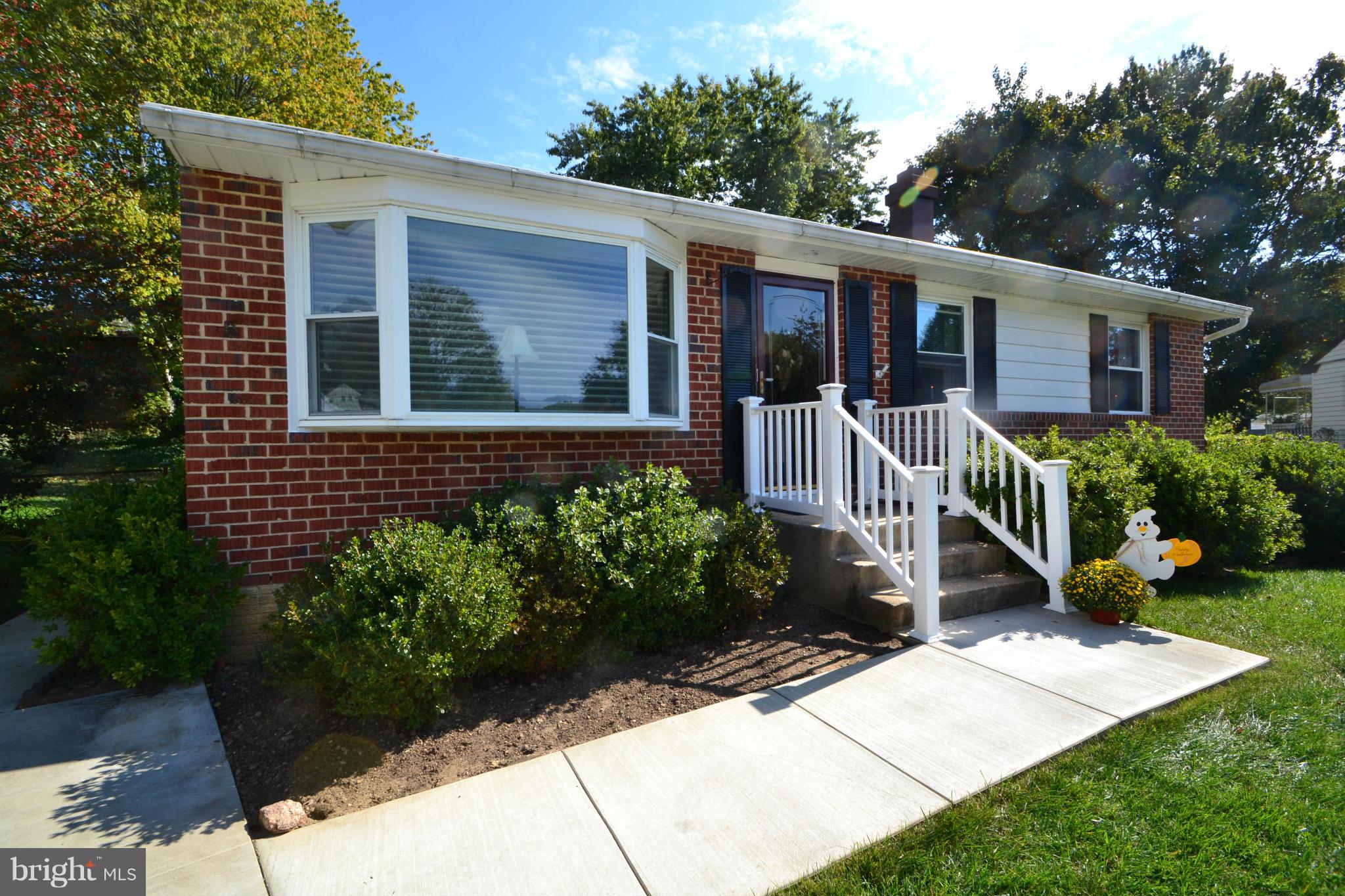 311 Bryanstone Road Reisterstown, MD 21136 - Photo 23 of 23 a front view of a house with a yard