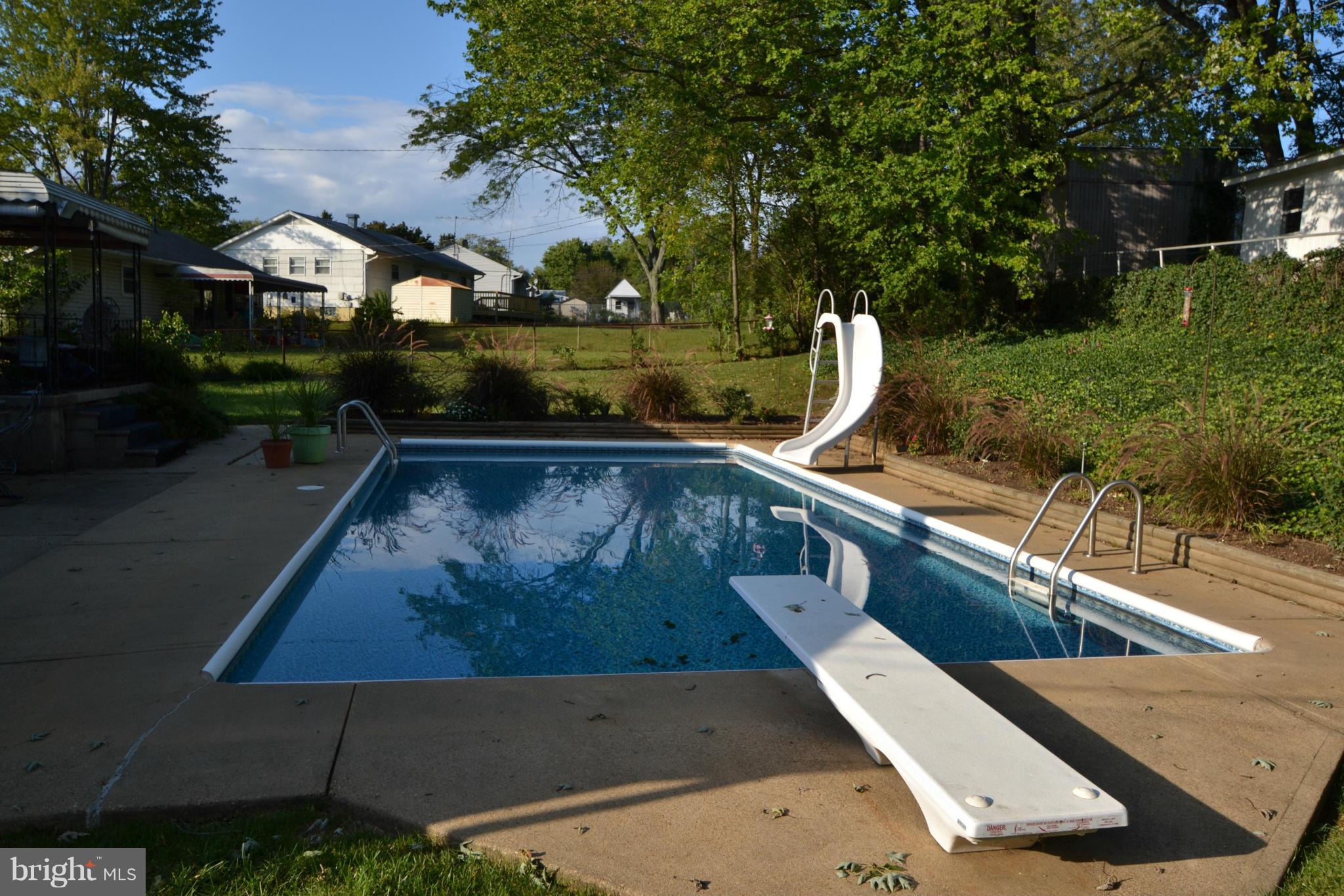 311 Bryanstone Road Reisterstown, MD 21136 - Photo 5 of 23 a view of a swimming pool with a patio