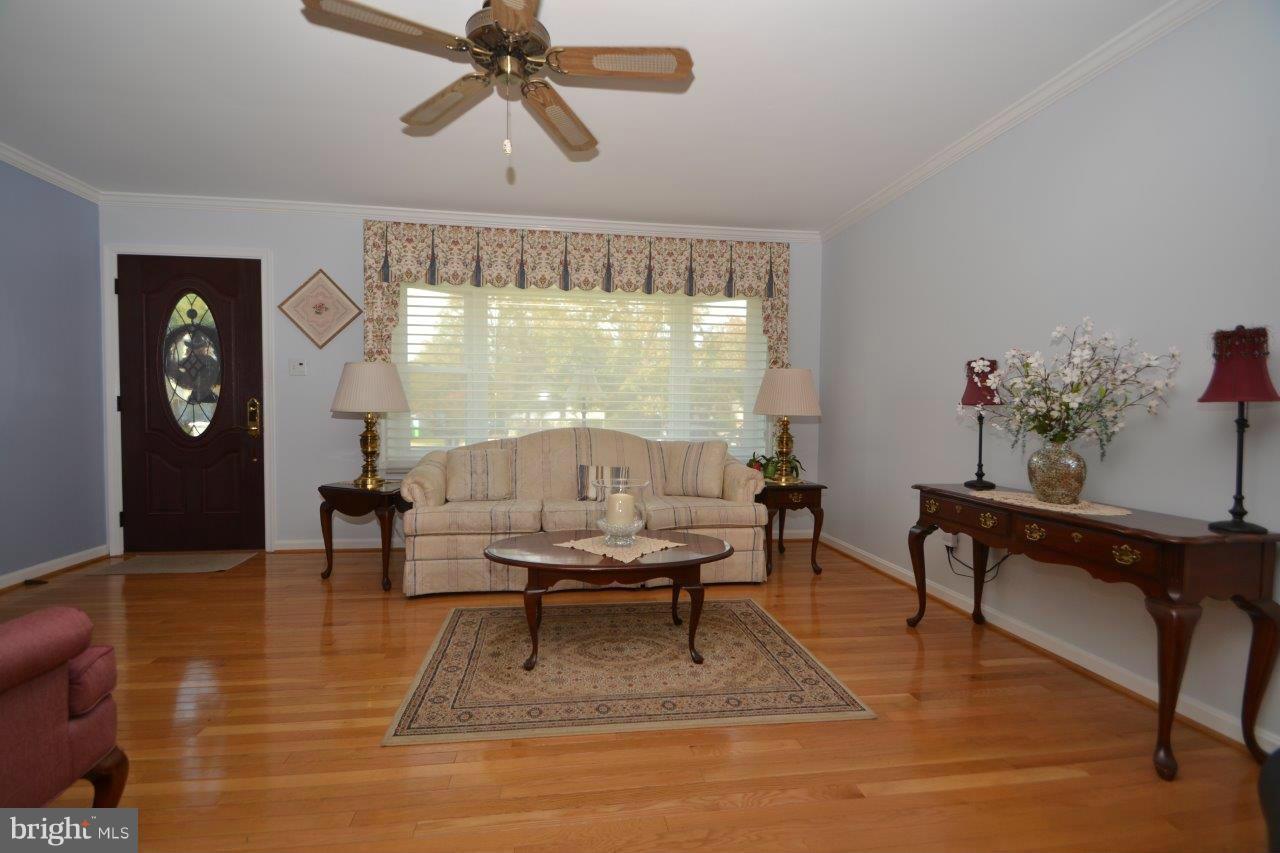 311 Bryanstone Road Reisterstown, MD 21136 - Photo 7 of 23 a living room with furniture and a large window