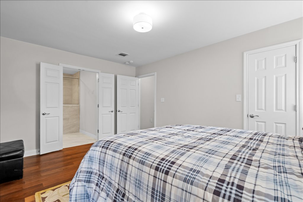 608 Whistleville Road Flatonia, TX 78941 - Photo 9 of 26 There is an ensuite bathroom and a spacious walk in closet.