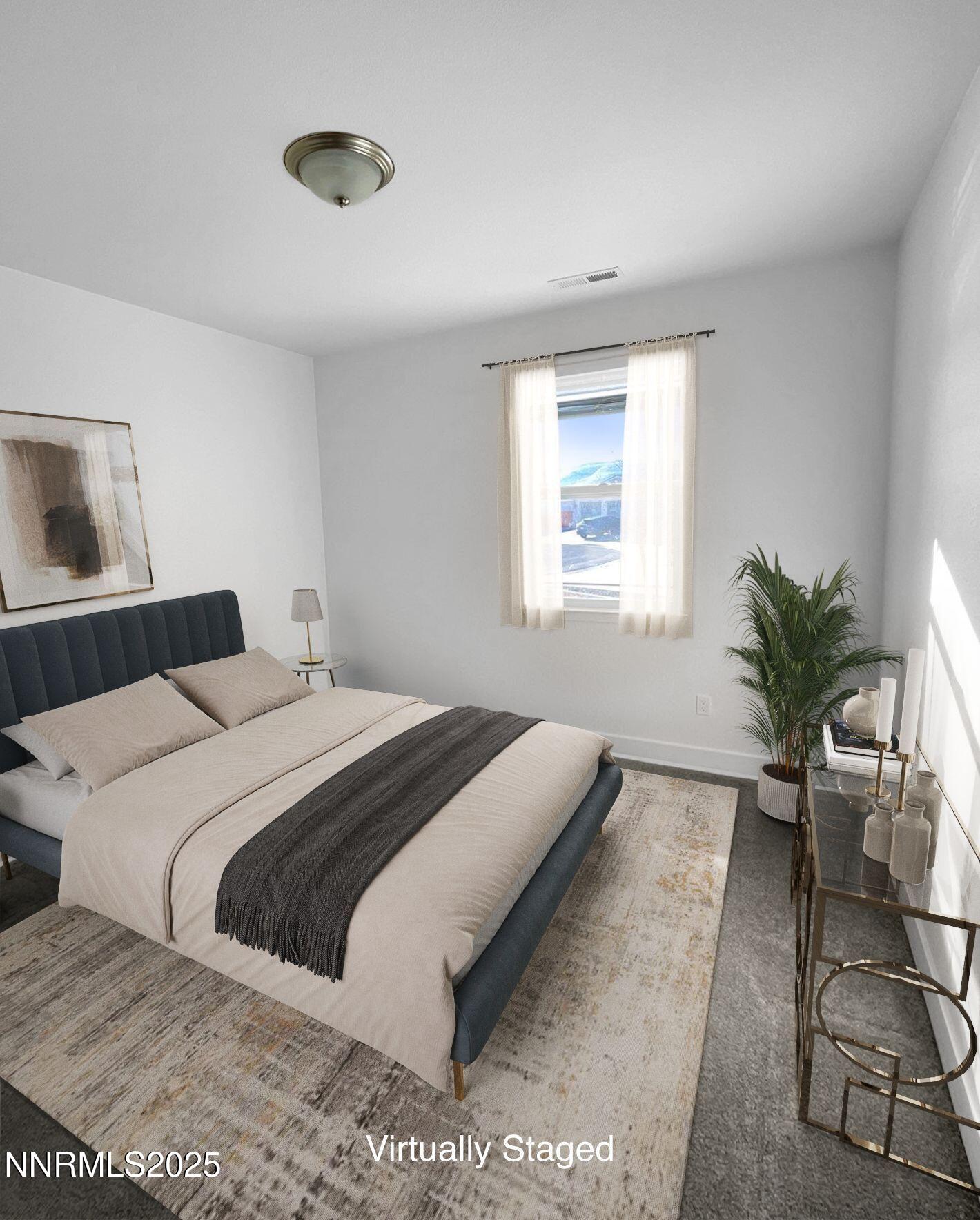 1160 Church Peak Court Reno, NV 89508 - Photo 11 of 17 a bedroom with a bed and mirror on the dresser