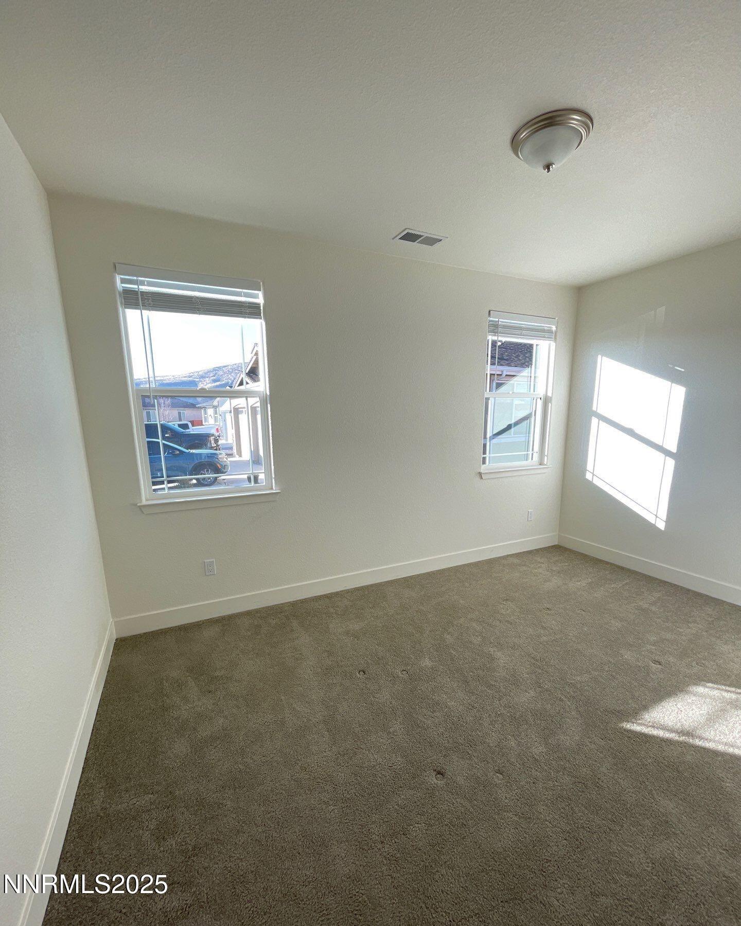 1160 Church Peak Court Reno, NV 89508 - Photo 13 of 17 a view of an empty room with a window