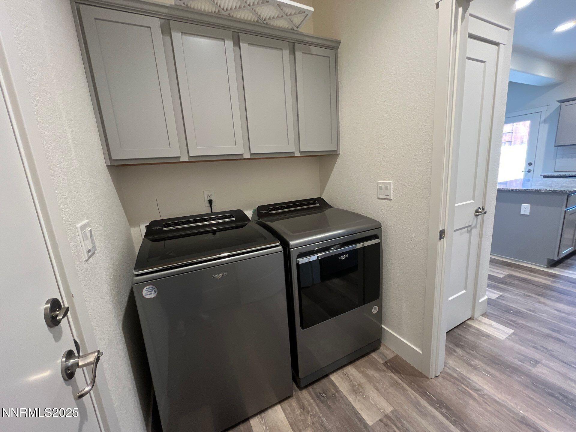 1160 Church Peak Court Reno, NV 89508 - Photo 14 of 17 a utility room with wooden floor washer and dryer