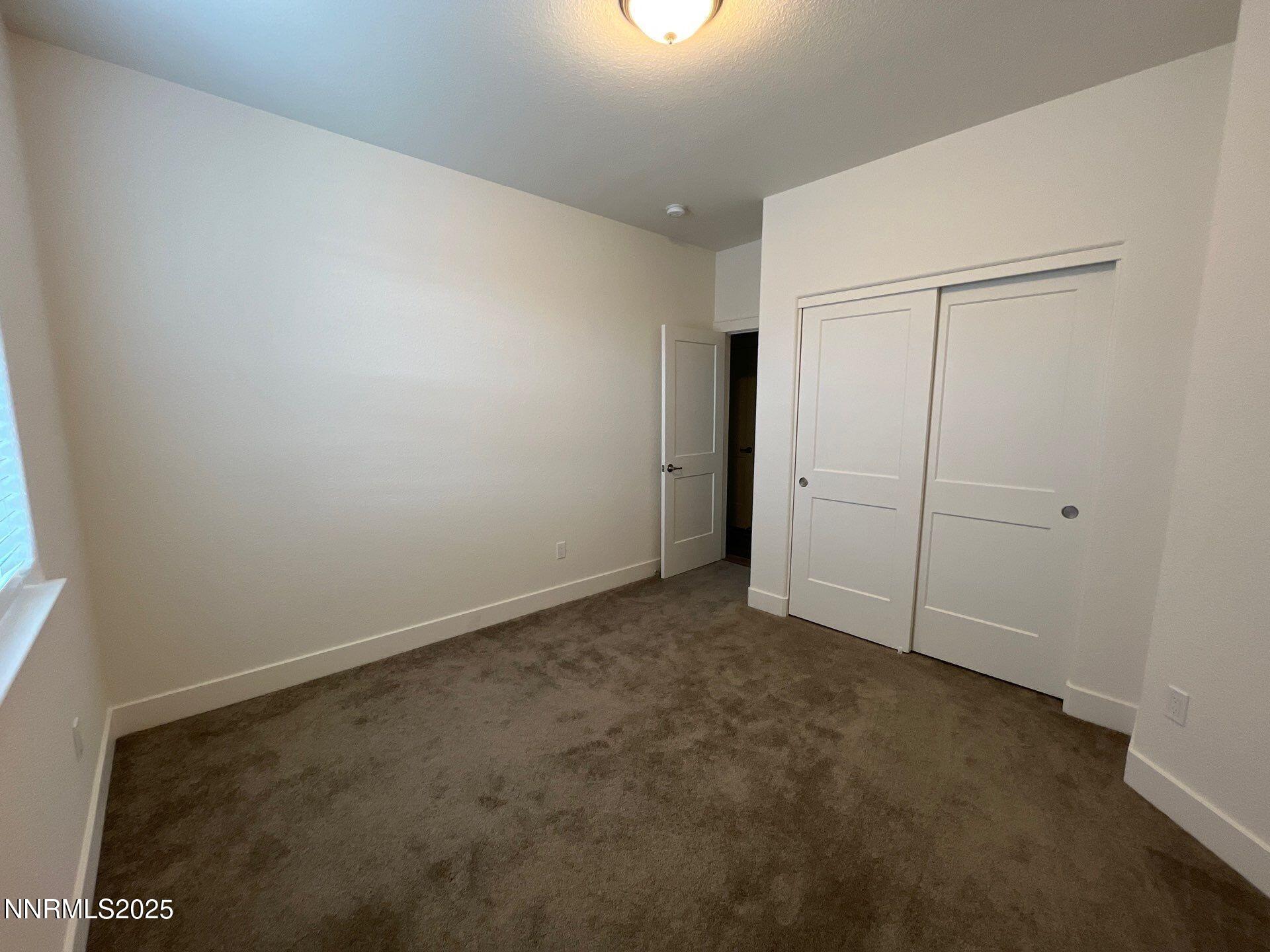 1160 Church Peak Court Reno, NV 89508 - Photo 9 of 17 an empty room with closet area