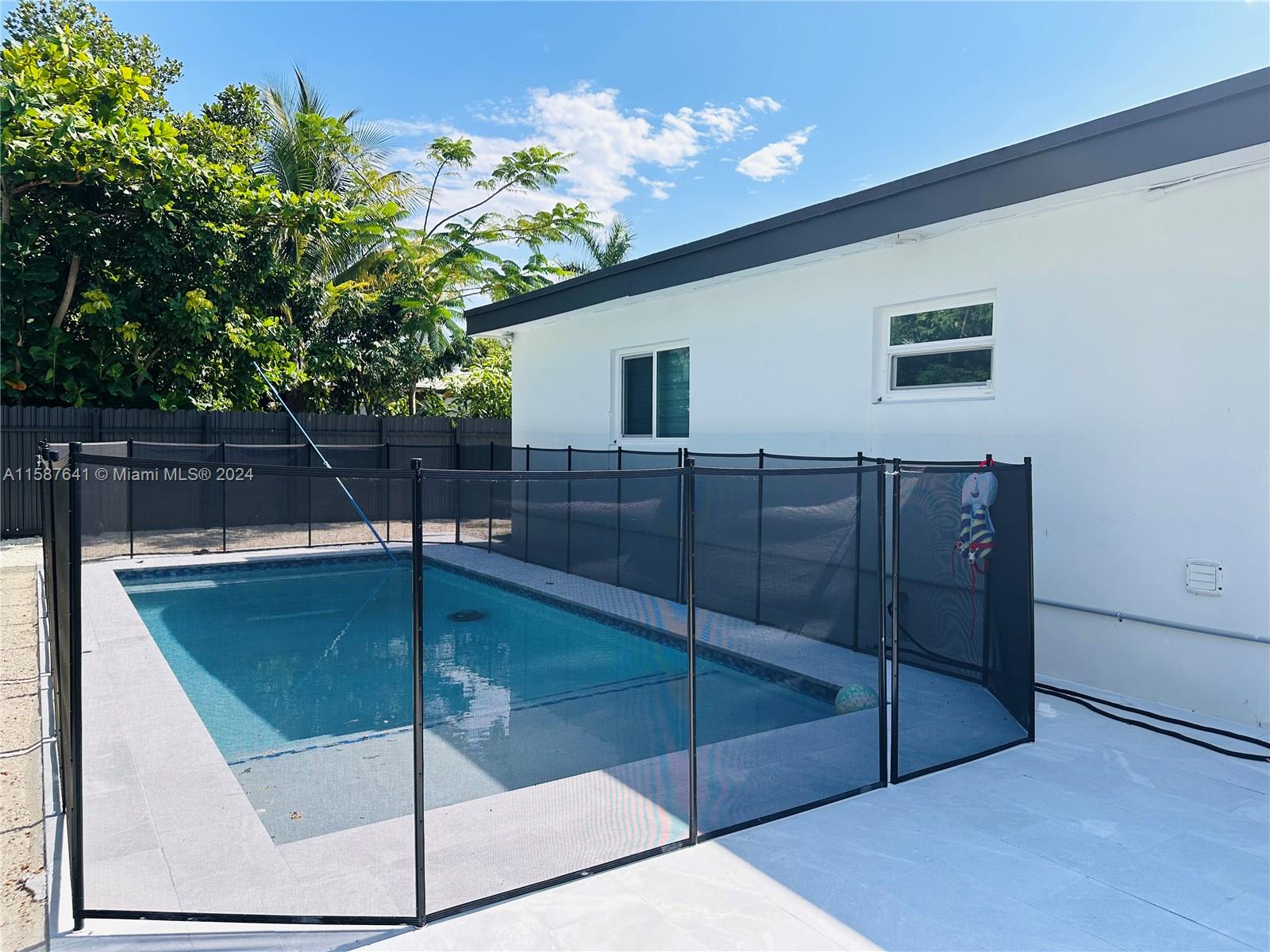 17841 Southwest 113th Avenue Miami, FL 33157 - Photo 19 of 23 a bath room with a glass door