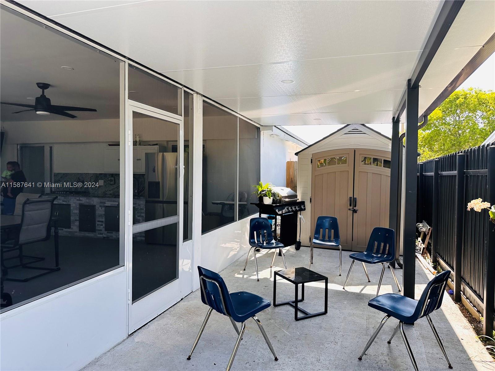 17841 Southwest 113th Avenue Miami, FL 33157 - Photo 21 of 23 a view of a livingroom with furniture and front door