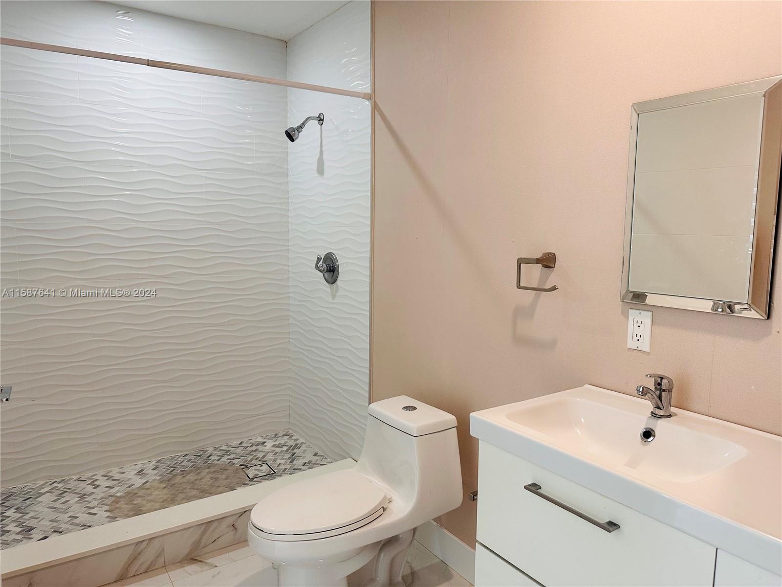 17841 Southwest 113th Avenue Miami, FL 33157 - Photo 23 of 23 a bathroom with a sink a toilet and shower