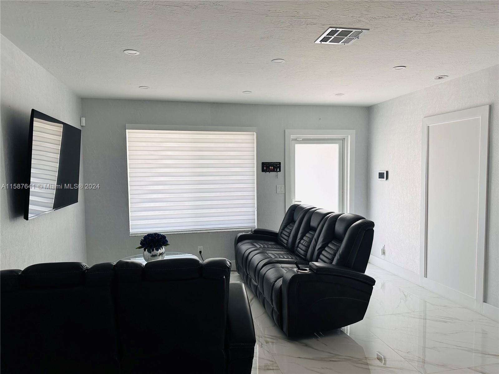 17841 Southwest 113th Avenue Miami, FL 33157 - Photo 4 of 23 a living room with furniture