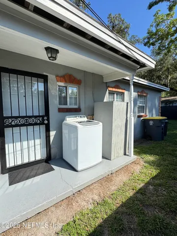 a house view with a outdoor space