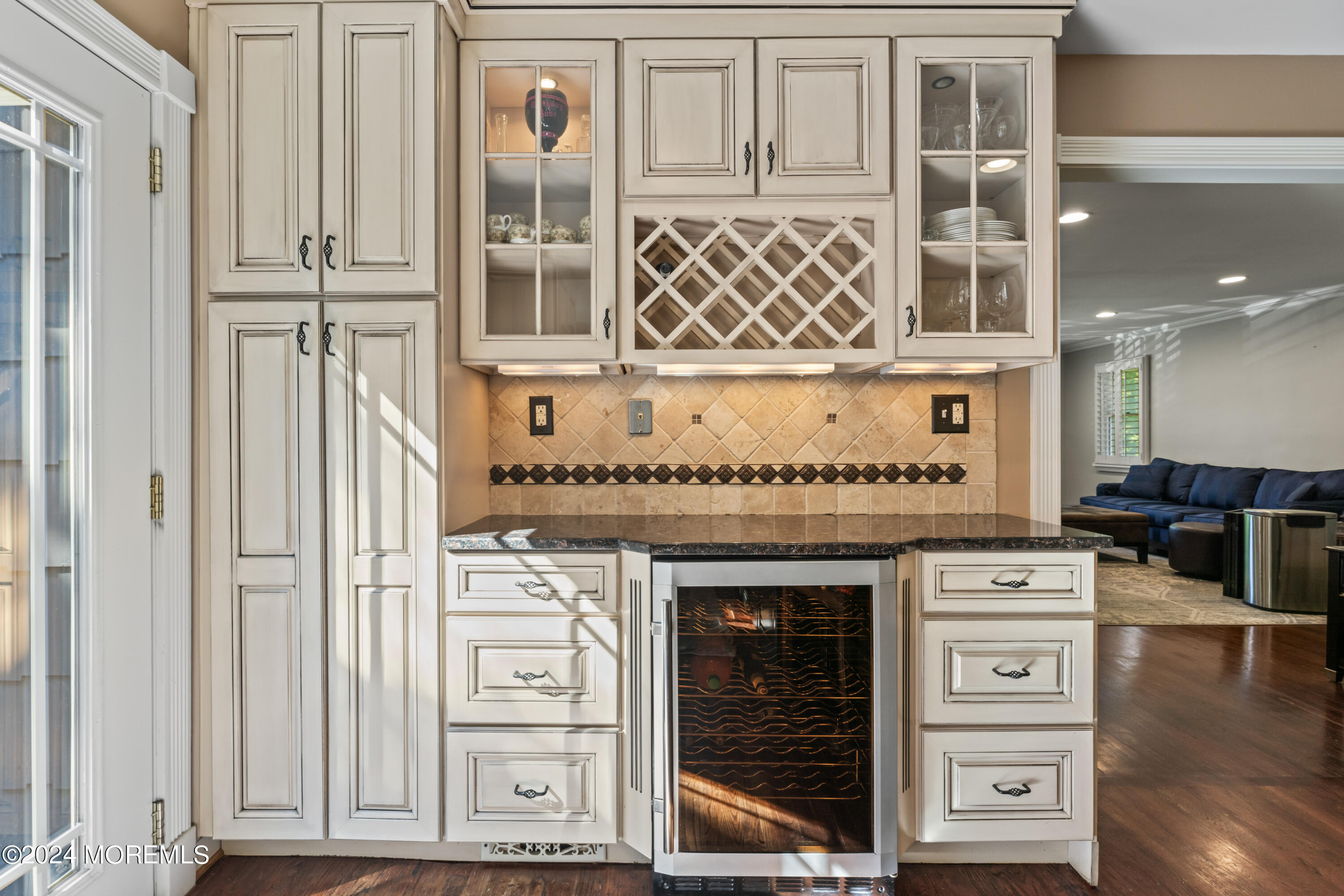 54 Rutherford Road Berkeley Heights, NJ 07922 - Photo 13 of 43 a view of a kitchen with stainless steel appliances wooden floor and living room view