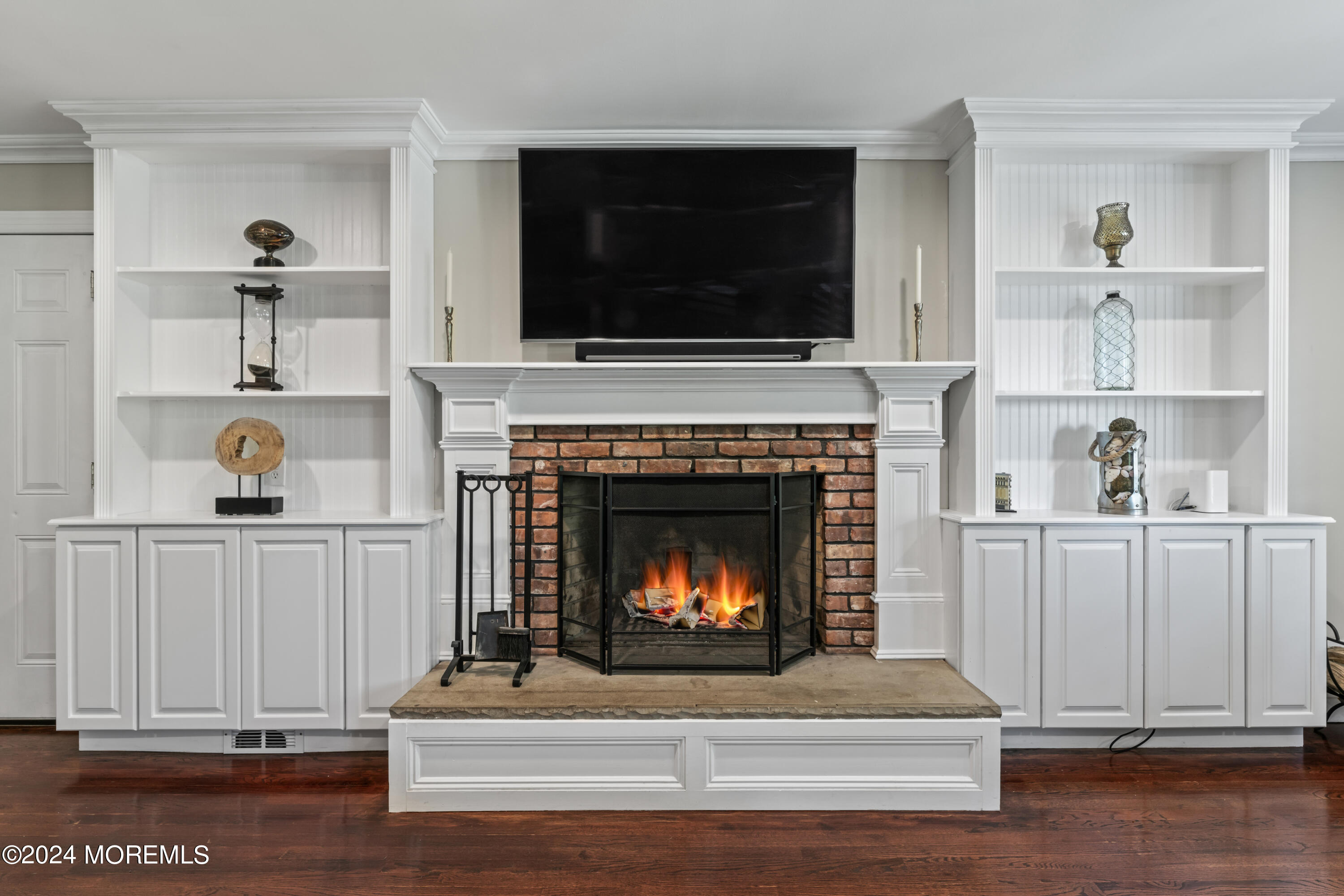 54 Rutherford Road Berkeley Heights, NJ 07922 - Photo 18 of 43 a living room with furniture and a fireplace