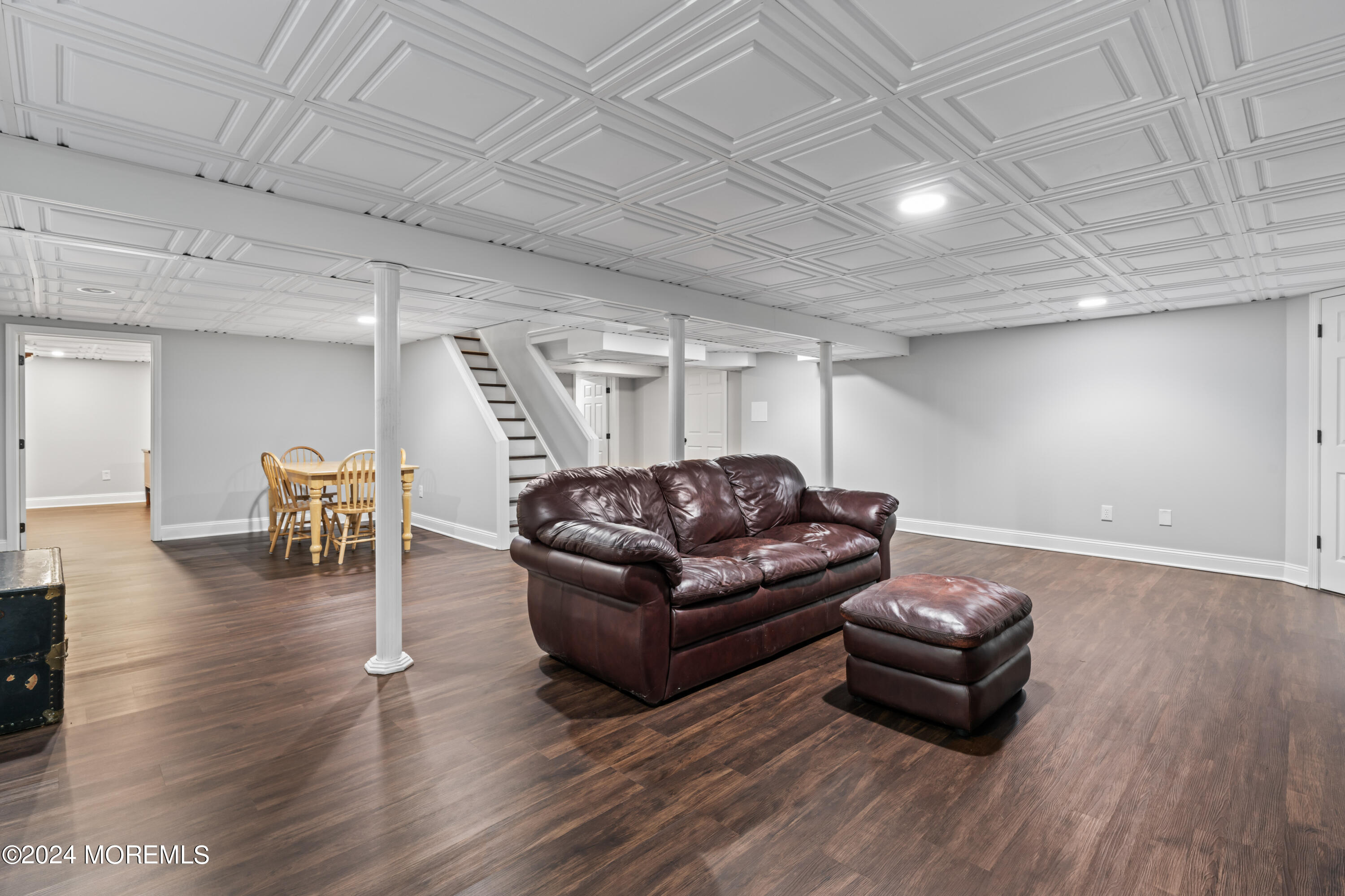 54 Rutherford Road Berkeley Heights, NJ 07922 - Photo 27 of 43 a living room with furniture and a wooden floor